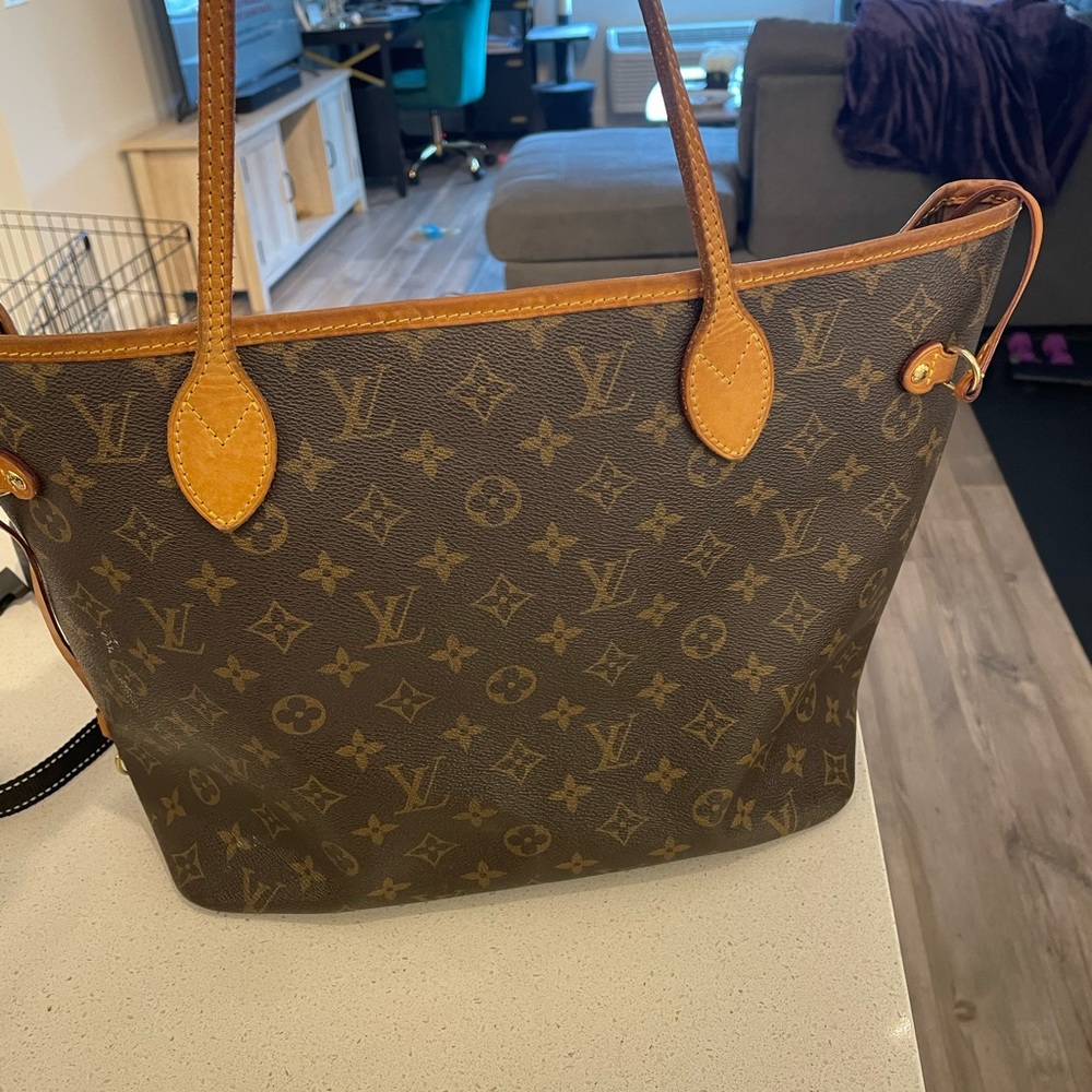 Used LV Never Full MM.